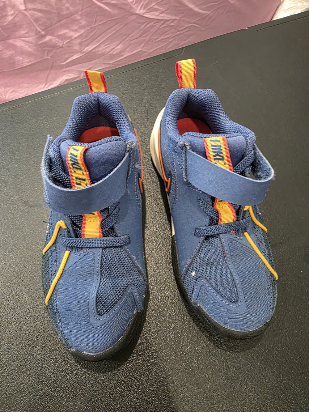 Nike Kids Blue Sneakers with Orange and Red Accents